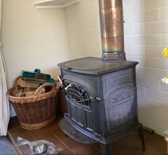 Pile of logs by log burner