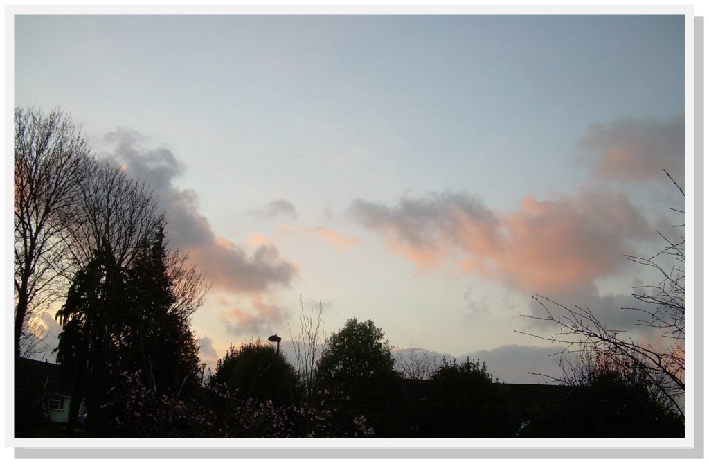 Photo of early morning sky over village houses